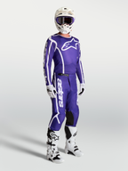 Alpinestars maglia Fluid Apex V2 e pantaloni, completo motocross per uomo, blu e bianco, con casco e stivali bianchi.