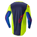 Alpinestars Racer Hoen Jersey 2024, maglia da motocross, giallo fluo e blu notte, vista posteriore con pannello centrale blu scuro e logo rosso, sezioni laterali giallo brillante, maniche lunghe, in tessuto a rete traspirante per prestazioni fuoristrada