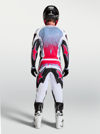 Alpinestars maglia Fluid Drag, maglia da motocross da uomo, nero e rosso fluo, vista posteriore su un pilota.