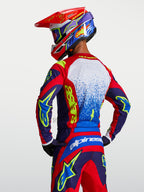 Alpinestars Maglia Fluid Drag, maglia da motocross da uomo, blu e rossa, tessuto tecnico leggero e traspirante.