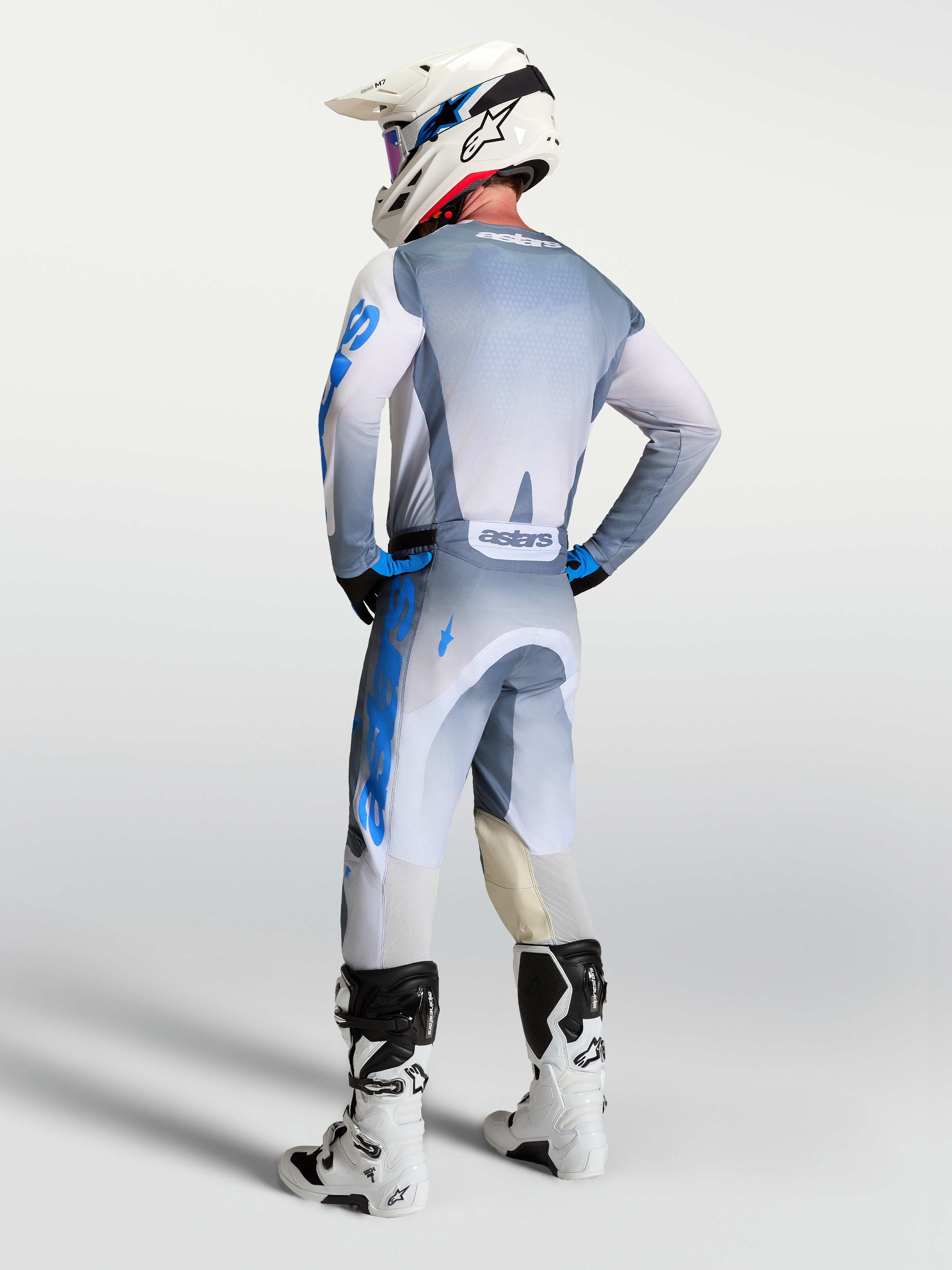Alpinestars Maglia Racer Amber, maglia motocross uomo, grigio e blu, vista posteriore con vestibilità race fit.