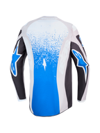 Alpinestars Maglia Fluid Drag, maglia da motocross da uomo, blu e grigia, vista posteriore con grafiche splatter e loghi a stella.