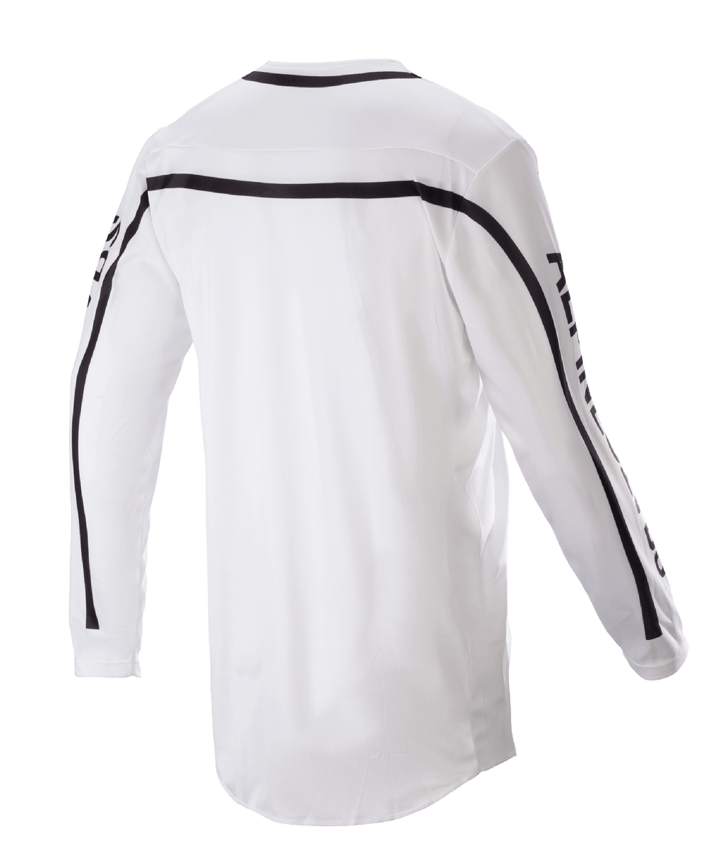 Maglia Alpinestars Racer Found 2023, maglia da motocross, bianca, vista posteriore con strisce nere su spalle e maniche, orlo posteriore allungato per una maggiore copertura, costruzione in leggero poli-tessuto