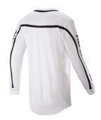 Maglia Alpinestars Racer Found 2023, maglia da motocross, bianca, vista posteriore con strisce nere su spalle e maniche, orlo posteriore allungato per una maggiore copertura, costruzione in leggero poli-tessuto