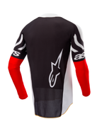 Alpinestars Maglia Limited Edition Techstar Deep, maglia da motocross, vista posteriore, nera e bianca con maniche High Red, grande logo Alpinestars bianco sul retro, vestibilità atletica da gara in politessuto traforato