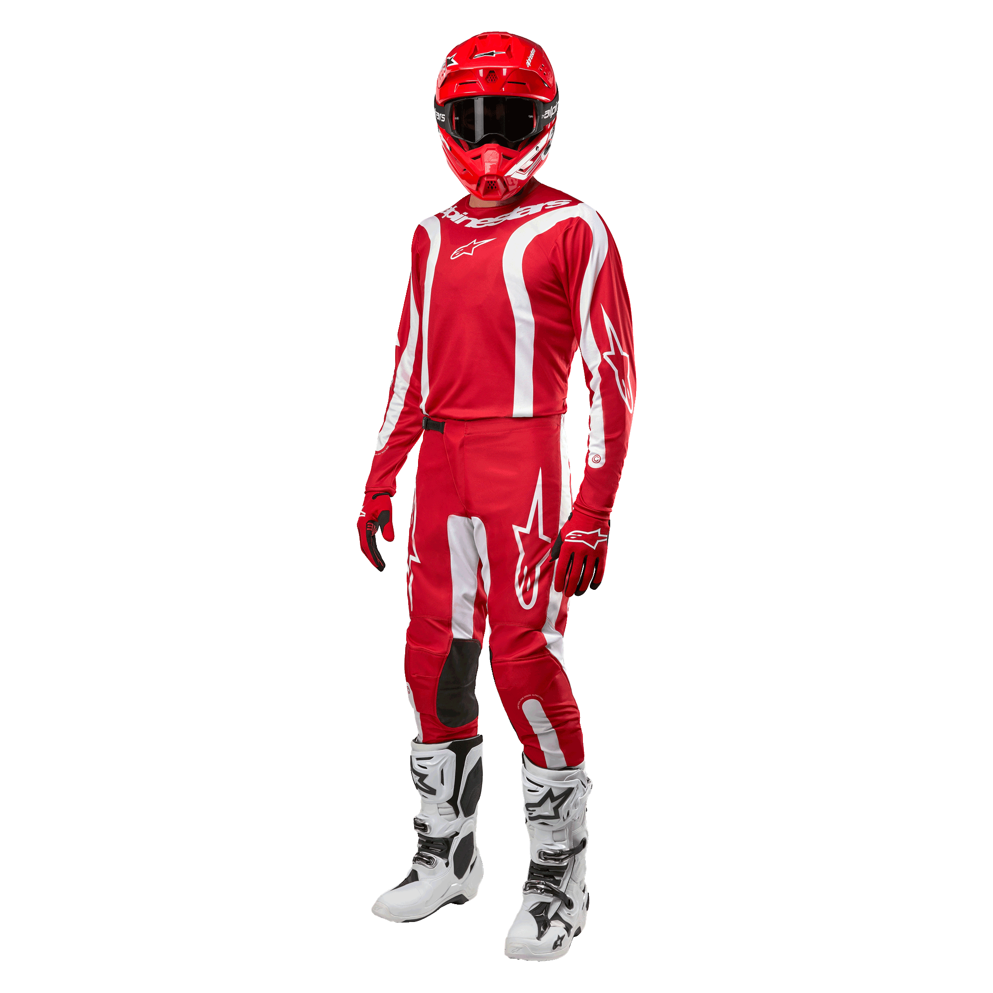 Pilota di motocross con abbigliamento completo da gara, maglia Alpinestars Fluid Lurv 2024 in Mars Red e bianco, pantaloni rossi coordinati con dettagli bianchi, casco rosso, guanti rossi e stivali bianchi e neri, outfit coordinato per gare fuoristrada
