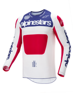 Alpinestars Maglia Techstar Fortitude Edizione Limitata, maglia da motocross, bianco, blu e rosso, corpo principale bianco con pannello blu sul petto e grafica rossa, loghi Alpinestars blu sulle maniche, design con vestibilità atletica da gara