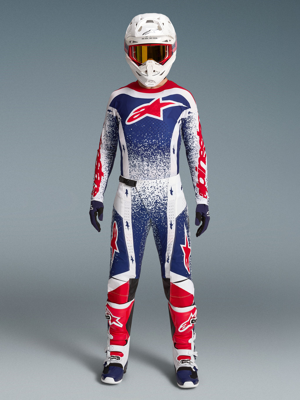 Alpinestars Techstar Unity Maglia Limited Edition, completo motocross uomo, blu, bianco e rosso con grafiche racing punteggiate.