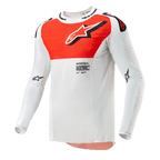 Maglia Alpinestars Supertech Ward 2024, maglia da motocross, bianco e arancione acceso, capo tecnico a maniche lunghe con una grande grafica arancione sul petto, logo a stella e costruzione traforata traspirante per corse fuoristrada