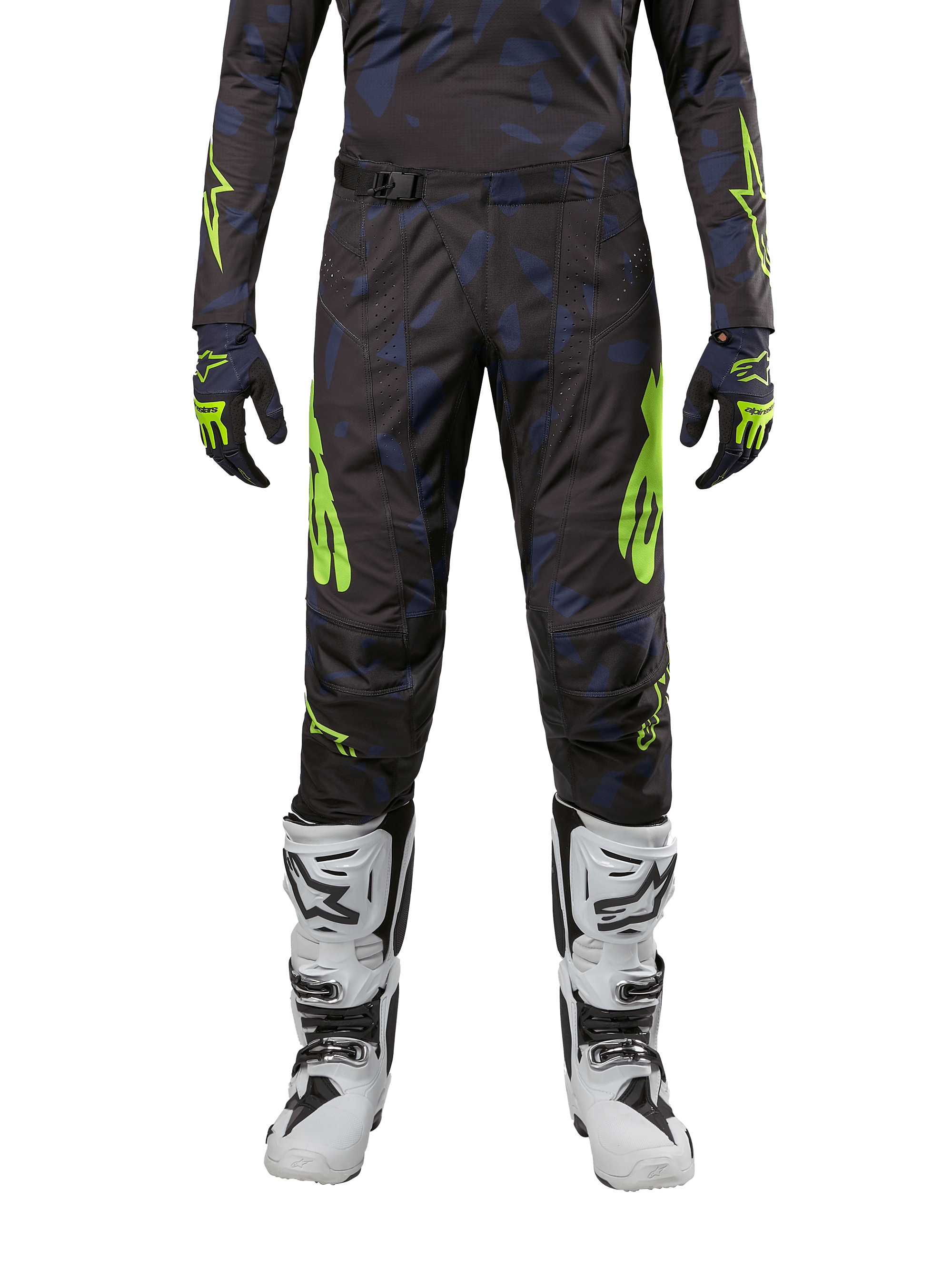 Alpinestars Pantaloni Techstar Rantera 2024, pantaloni da motocross, nero, navy e giallo fluo, indossati con maglia a maniche lunghe abbinata, guanti e stivali da motocross bianchi, con accenti giallo neon e motivo astratto scuro.