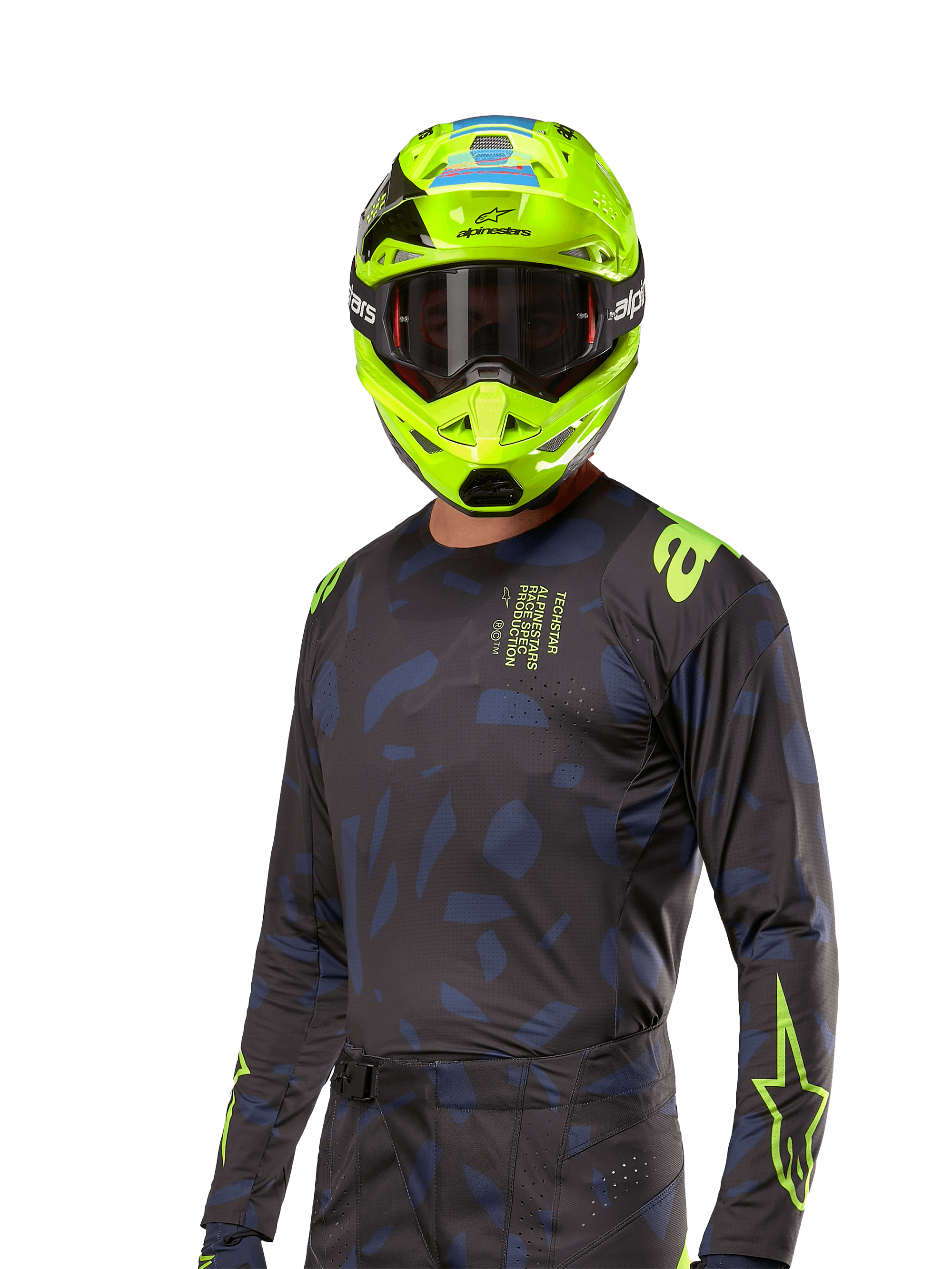Alpinestars 2024 Techstar Rantera Jersey, maglia da motocross, nero e blu navy con motivi astratti e accenti giallo neon, indossata con casco giallo neon coordinato, design performance fit per la guida off-road