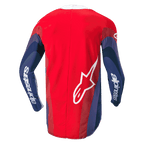 Alpinestars 2024 Techstar Pneuma Jersey, maglia da motocross, rosso, blu e bianco, vista posteriore con grafiche ondulate sulle maniche, scritta Alpinestars bianca sulle braccia e logo Astar sulla parte inferiore della schiena, design ergonomico per la guida fuoristrada