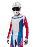 Alpinestars 2024 Techstar Pneuma Jersey, maglia da motocross, blu, rosso Mars e bianco con accenti viola, vestibilità atletica da gara, abbigliamento tecnico a maniche lunghe indossato con casco e guanti bianchi