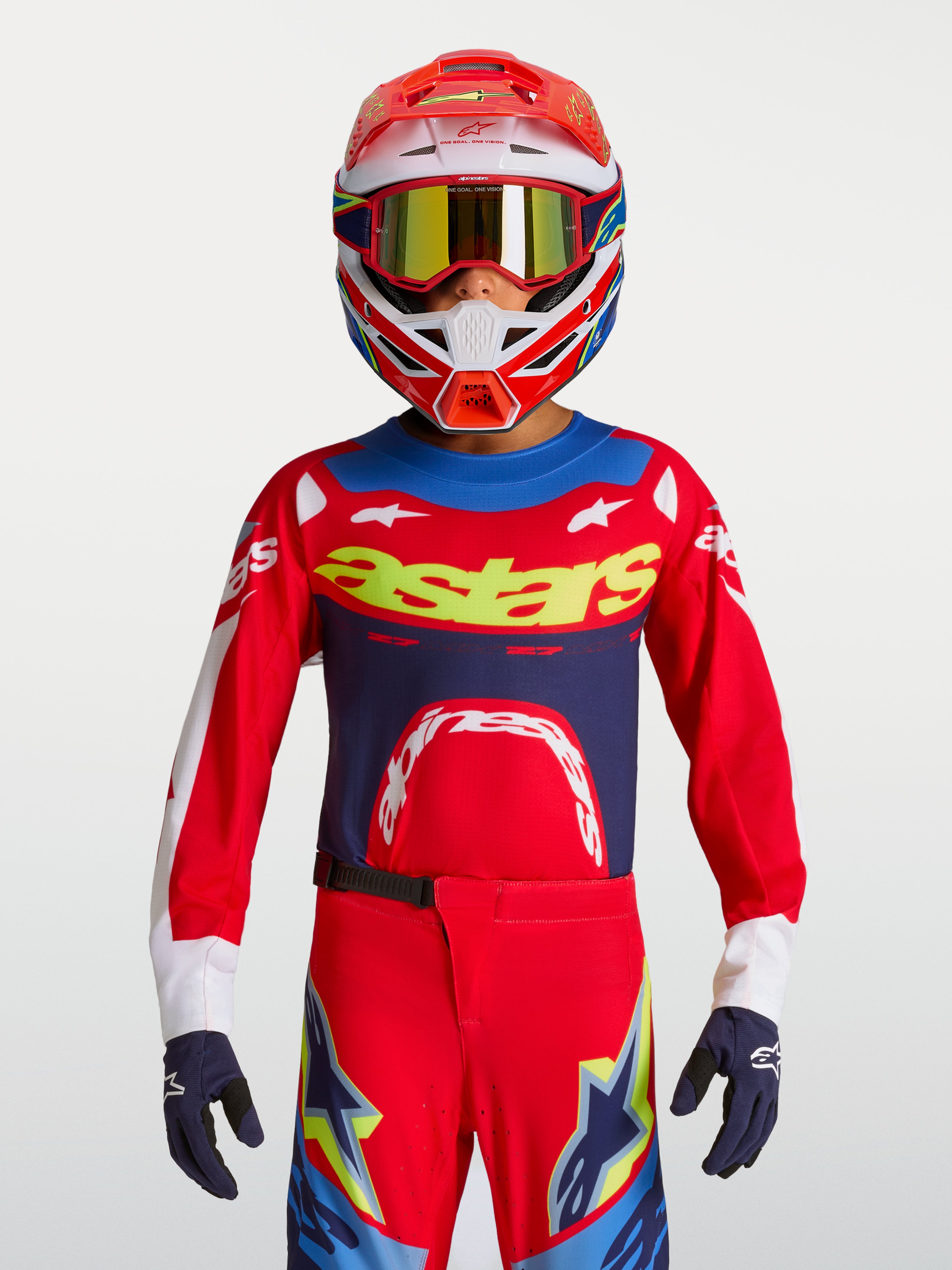 Alpinestars Maglia Supertech Dyna Ragazzo 2027, maglia da motocross rossa e blu navy in mesh elasticizzato traspirante.