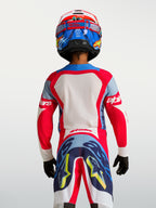 Maglia Alpinestars Supertech Dyna Ragazzo 2027, maglia da motocross rossa e blu navy, vista posteriore in mesh elasticizzato.