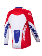 Alpinestars Youth Racer Veil Jersey 2025, maglia da motocross, rosso acceso e bianco con accenti blu, vista posteriore con evidente branding 'astars' su maniche e schiena, progettata per prestazioni off-road per ragazzi