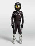 Alpinestars maglia Fluid Apex V2 Ragazzo e Gear Set, completo da motocross nero e argento per ragazzi con stivali bianchi