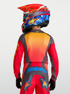 Alpinestars Maglia Fluid Hunt Ragazzo 2027, maglia da motocross rossa e grigia per ragazzi, vista posteriore, tessuto traspirante.