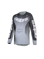 Alpinestars Maglia Fluid Amber Ragazzo 2027, maglia da motocross grigia e bianca, tessuto tecnico traspirante per fuoristrada.