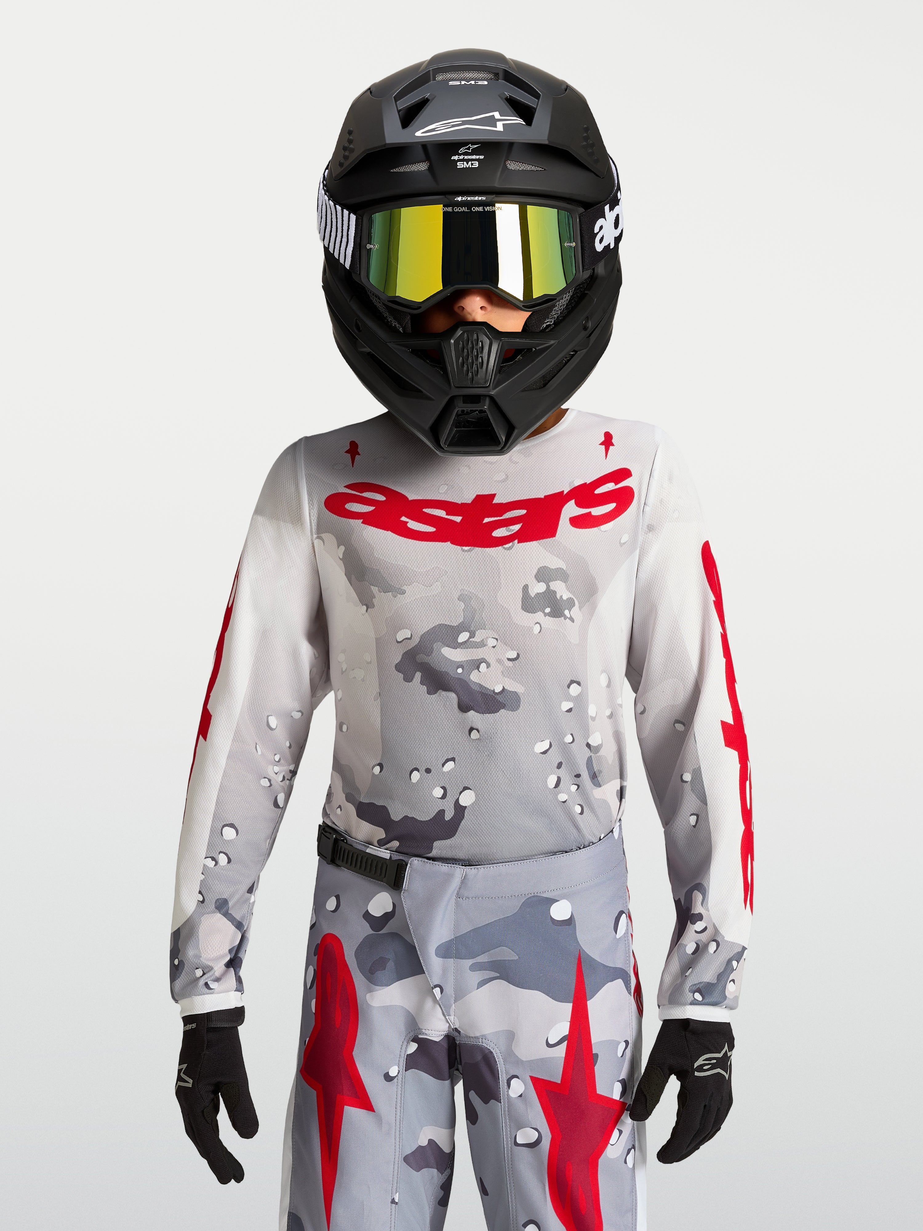 Alpinestars Maglia Fluid Lone Ragazzo 2027, maglia motocross grigio mimetico e rosso fuoco, in politessuto per ragazzi.
