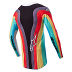 Maglia Alpinestars Stella Techstar Donna 2024, maglia da motocross, nero multicolore, vista posteriore con vivace motivo a onde in rosso, giallo e turchese, logo Astar bianco sulla parte inferiore della schiena e marchio Alpinestars sulle maniche.