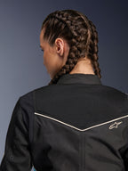 Giacca da moto Alpinestars Stella T-Dyno Air, giacca da donna, nero con dettagli ecru, vista ravvicinata dello sprone posteriore con rete 3D estesa per la ventilazione e piccolo logo Alpinestars ricamato