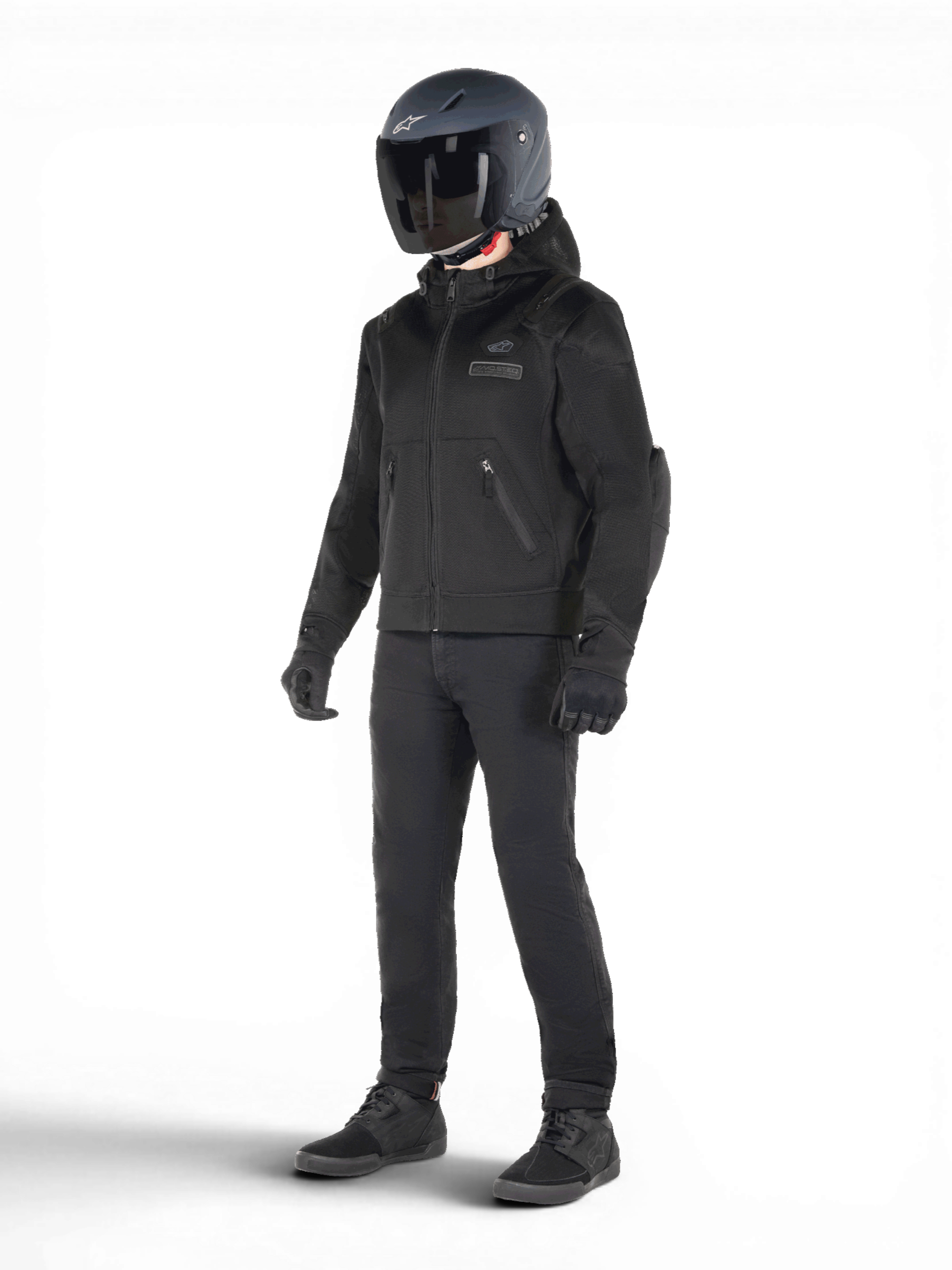 Alpinestars Felpa con cappuccio Moflow Air Tech, giacca da moto urban da uomo, nera, in mesh traspirante, predisposta per sistema airbag Tech-Air 3, con protezioni Nucleon Flex Plus, indossata da un modello con casco
