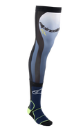 Alpinestars Knee Brace Socks, calze lunghe da motocross, blu notte e giallo fluo, con parte superiore in Lycra elasticizzata e inserti in rete, bordo con presa in silicone e supporto imbottito per la caviglia per protezione off-road