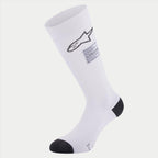 Calzini Alpinestars ZX V4, calzini per gare automobilistiche, bianchi con dettagli neri su tallone e punta, con logo Alpinestars nero ed etichetta di conformità FIA, strato base tecnico senza cuciture per il motorsport