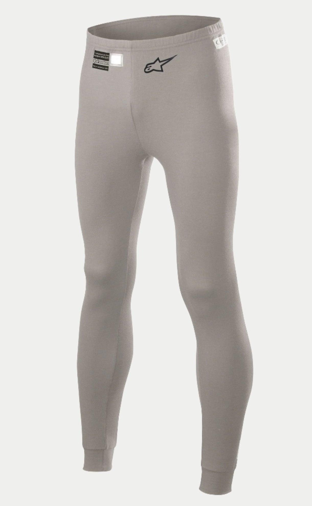 Alpinestars Race V2 Bottom FIA, pantaloni intimo tecnico per auto racing, grigio medio, con logo a stella nero sulla gamba ed etichetta di omologazione FIA in vita, tessuto ignifugo leggero con polsini alle caviglie.