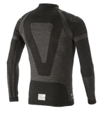 Alpinestars ZX Evo V2 Top a maniche lunghe, base layer per auto racing, nero e grigio, vista posteriore con design tecnico jacquard, costruzione tubolare senza cuciture ed etichetta di certificazione FIA/SFI sull'orlo