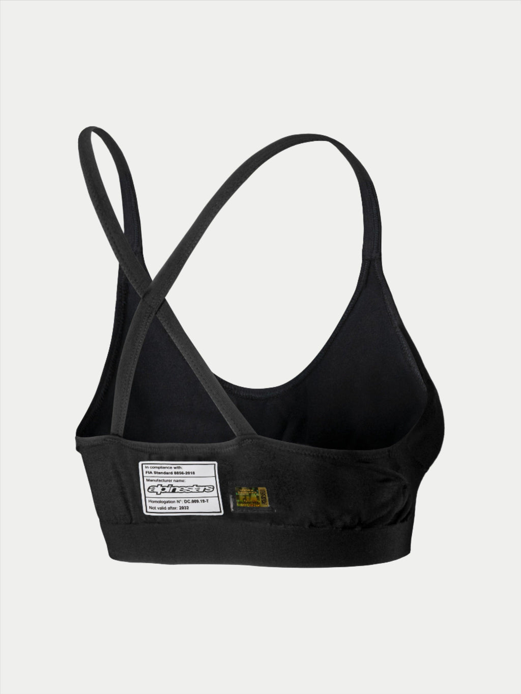 Alpinestars Stella TECH ZX Bra, reggiseno intimo tecnico per gare automobilistiche, nero, vista posteriore con etichetta di certificazione FIA 8856-2018, spalline sottili incrociate, materiale leggero resistente alle fiamme per protezione motorsport.