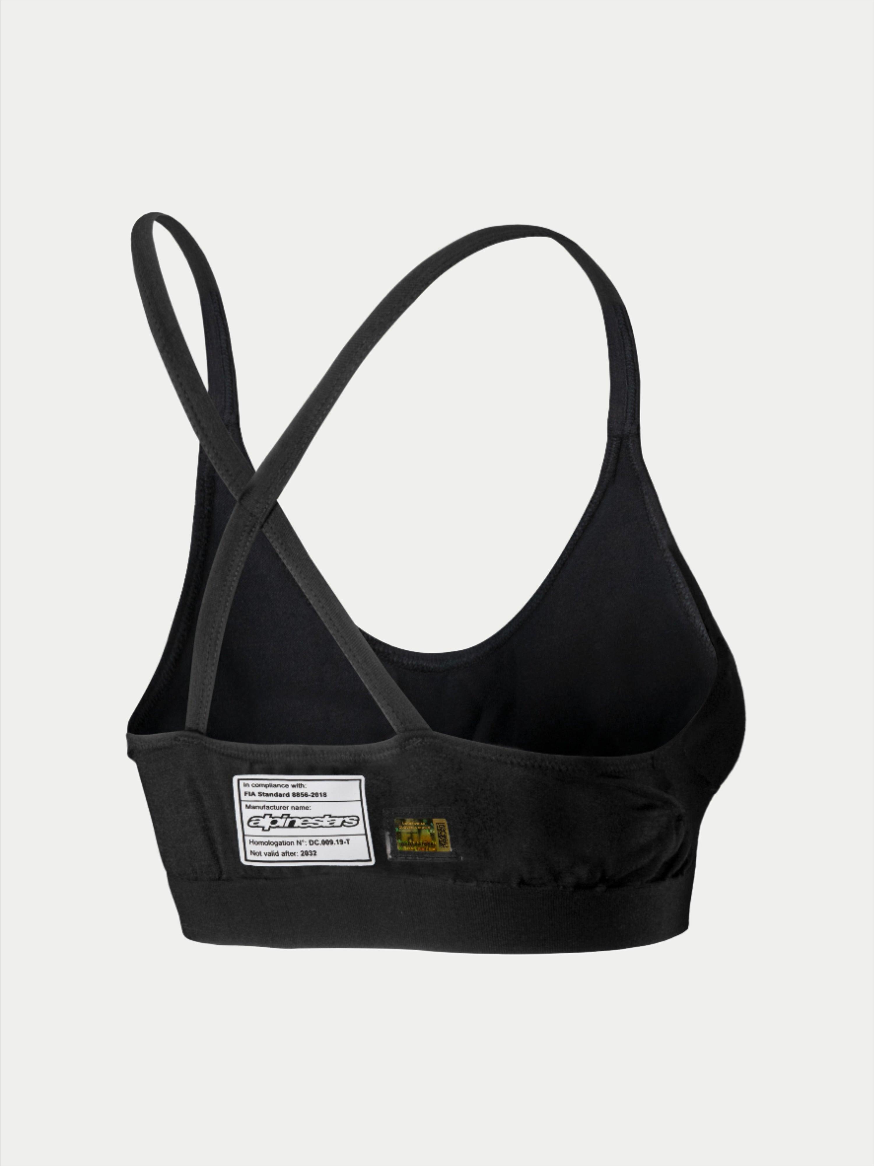 Alpinestars Stella TECH ZX Bra, reggiseno intimo tecnico per gare automobilistiche, nero, vista posteriore con etichetta di certificazione FIA 8856-2018, spalline sottili incrociate, materiale leggero resistente alle fiamme per protezione motorsport.