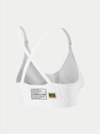 Alpinestars Stella TECH ZX Bra, intimo tecnico da corsa bianco ignifugo, vista posteriore con design delle spalline incrociate, etichetta di omologazione FIA 8856-2018 e ologramma, base layer leggero da donna