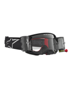 Alpinestars Maschere Supertech Firma Roll Off, maschere da motocross, nero e argento, con sistema roll-off integrato e lente trasparente, cinturino nero con logo Alpinestars, attrezzatura professionale per fuoristrada.