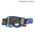 Alpinestars maschere Supertech Firma Roll Off, maschere da motocross e off-road racing unisex, blu e argento, con sistema roll-off integrato, lente in policarbonato e cinturino blu con logo bianco, progettate per prestazioni d'élite in Supercross e MX.
