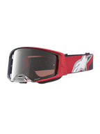 Maschere Alpinestars Supertech Hiten da motocross, rosse e nere con lente argento specchiata per racing off-road.