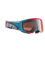 Maschere Alpinestars Supertech Stream, maschere da motocross, montatura grigia con accenti blu e rosa, lente Silver Multi Mirror, fascia teal e grigia con logo bianco, occhiali da corsa fuoristrada ad alte prestazioni