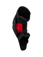 Alpinestars SX-1 Plasma Knee Protector, ginocchiera da motocross, nero e rosso, vista interna che evidenzia l'inserto rosso Nucleon PLASMA e il sistema di chiusura a doppio cinturino, progettata per prestazioni fuoristrada