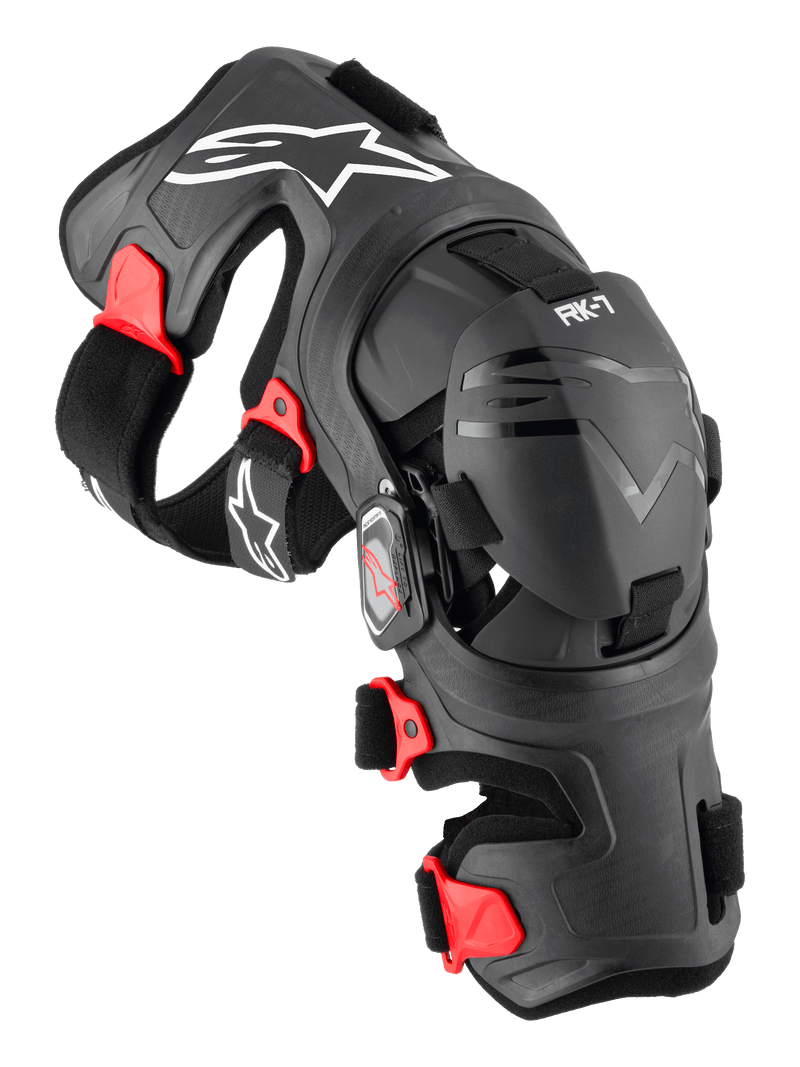 Ginocchiera Alpinestars RK-7 Plasma, protezione per ginocchia da motocross, nero con dettagli rossi e loghi bianchi, telaio ergonomico rinforzato in fibra con cinghie regolabili e sistema di cerniere a quattro punti, attrezzatura protettiva resistente per il fuoristrada