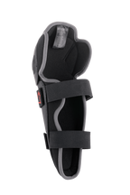 Alpinestars Bionic Action Knee Protector, ginocchiera da motocross, nero e grigio, vista interna con doppio sistema di cinghie elasticizzate, imbottitura in schiuma e design asimmetrico ergonomico per la guida fuoristrada