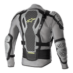 Giacca protettiva Alpinestars Bionic Action V2, vista posteriore, grigio e nero con accenti giallo fluo, dotata di protezioni per schiena, spalle e gomiti con tecnologia Cell altamente traforata, telaio in mesh grigio con cinghie regolabili nere e marchio Astars giallo