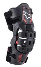Alpinestars Youth Bionic 5S Knee Brace, protezione per ginocchio da motocross, nero e rosso, con logo a stella bianco, sistema di cerniera articolato a quattro punti, telaio in composito con cinghie regolabili, progettata per gare fuoristrada giovanili