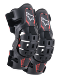 Ginocchiere Alpinestars Youth Bionic 5S, protezione ginocchio per motocross, nero e rosso, paio di protezioni caratterizzate da un design del telaio ibrido con scocche ventilate, logo Astar bianco sulla sezione superiore, marchio ASTARS rosso sulla sezione inferiore e cinturini neri regolabili per una vestibilità sicura.