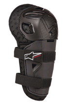 Alpinestars Bionic Action Kickstart Knee Guard, protezione ginocchio e stinco da motocross per ragazzi, nero, con guscio in plastica articolato, doppia chiusura elastica con logo bianco e marchio Kickstart rosso, supporto in rete imbottita per la protezione fuoristrada