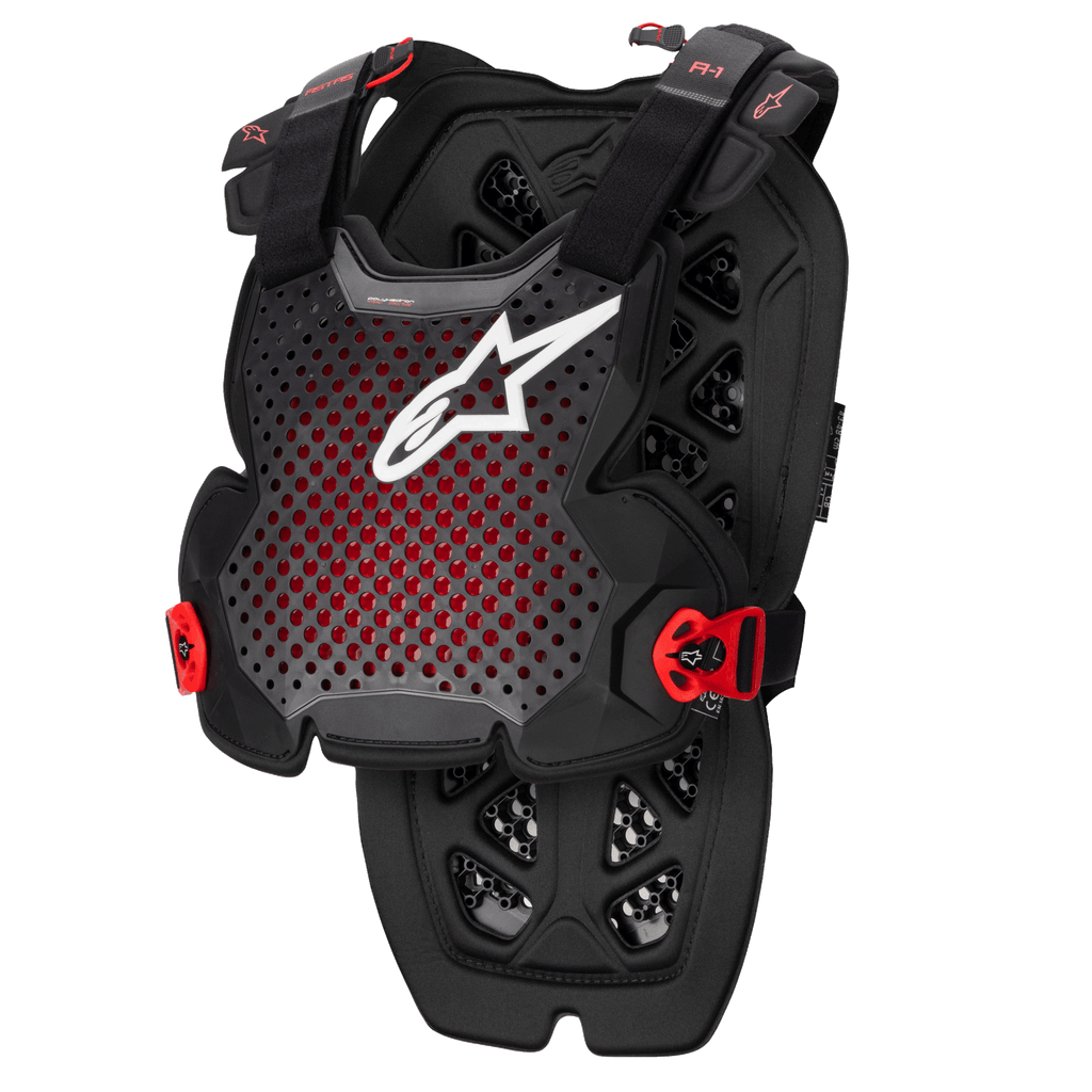 Alpinestars A-1 Pro Chest Protector, nero antracite e rosso, design traforato traspirante con logo bianco, cinghie regolabili con fibbie rosse, motivo di ventilazione esagonale, protezione leggera per motocross e guida off-road