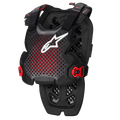 Alpinestars A-1 Pro Chest Protector, nero antracite e rosso, design traforato traspirante con logo bianco, cinghie regolabili con fibbie rosse, motivo di ventilazione esagonale, protezione leggera per motocross e guida off-road