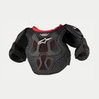 Protezione torace Alpinestars Youth Bionic Action Kickstart, pettorina da motocross, nero e rosso, con placche in TPR semirigide e rete a nido d'ape ventilata, logo Alpinestars bianco e protezioni per spalle e bicipiti.