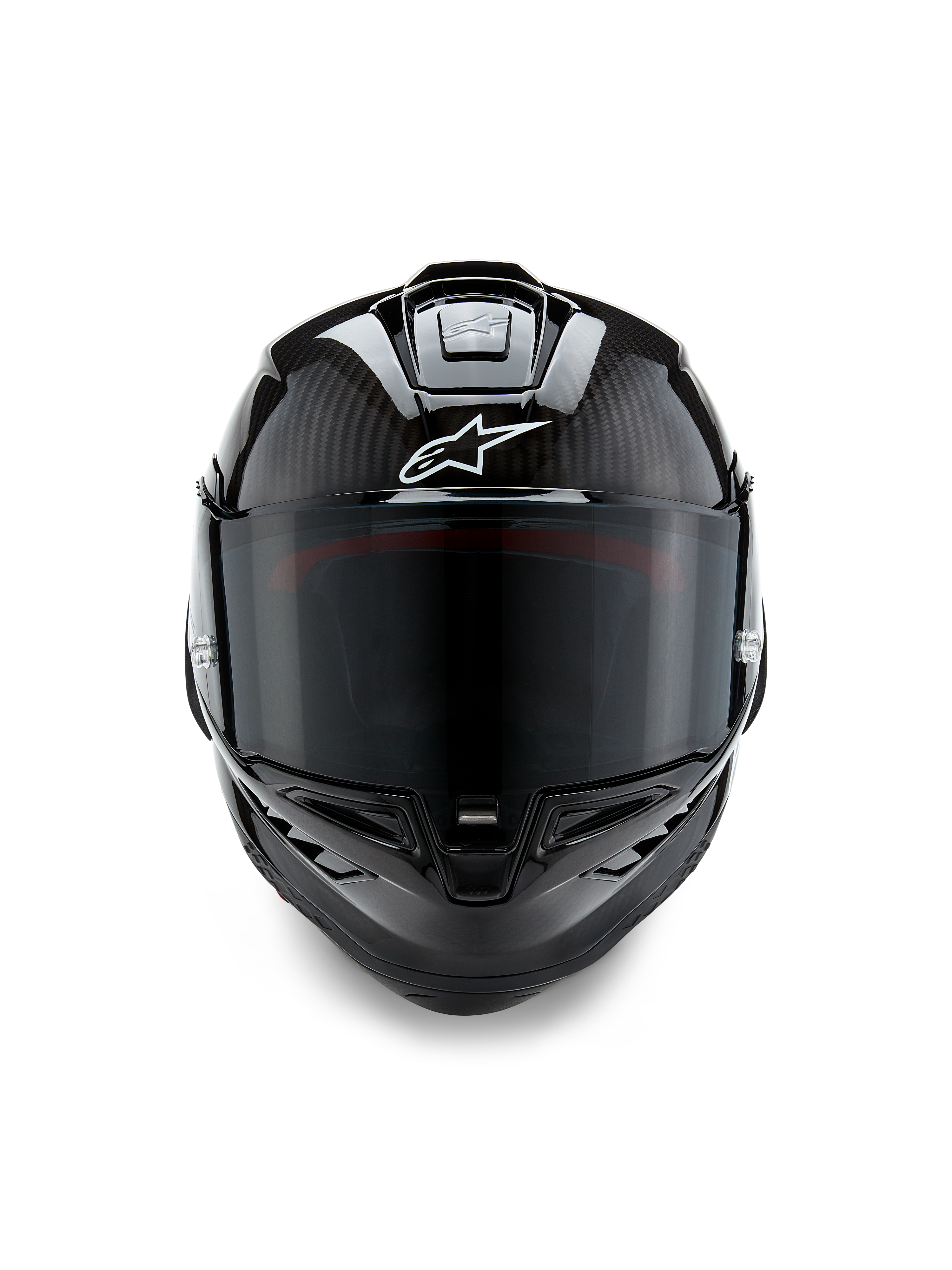 Casco Alpinestars Supertech R10 Solid, vista frontale, finitura in carbonio nero opaco e lucido, trama in fibra di carbonio a vista, logo Alpinestars bianco, visiera scura, casco da moto racing aerodinamico