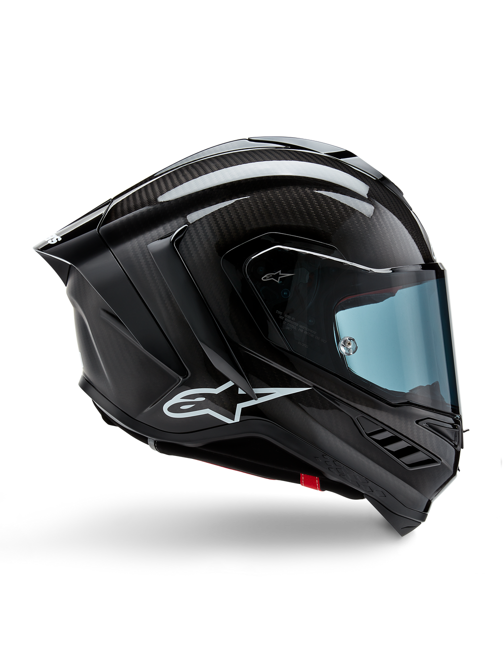 Casco Alpinestars Supertech R10 Solid, carbonio nero opaco e lucido, casco da moto racing, costruzione in fibra di carbonio, profilo laterale, visiera blu, design aerodinamico con alette, logo bianco, protezione ad alte prestazioni di livello MotoGP